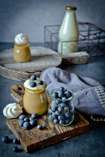 Brown wooden table yellow ceramic pot
